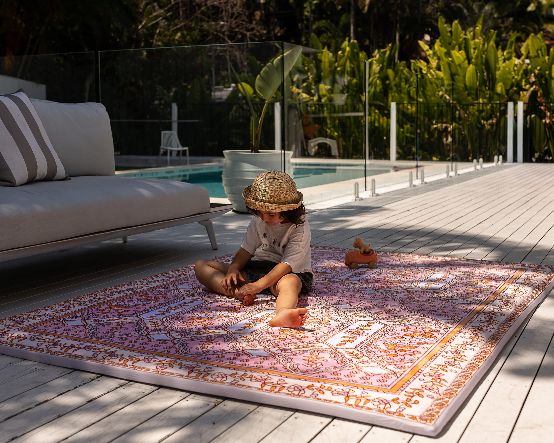 Soft boho baby rug for nursery – pastel pink and blue floral design