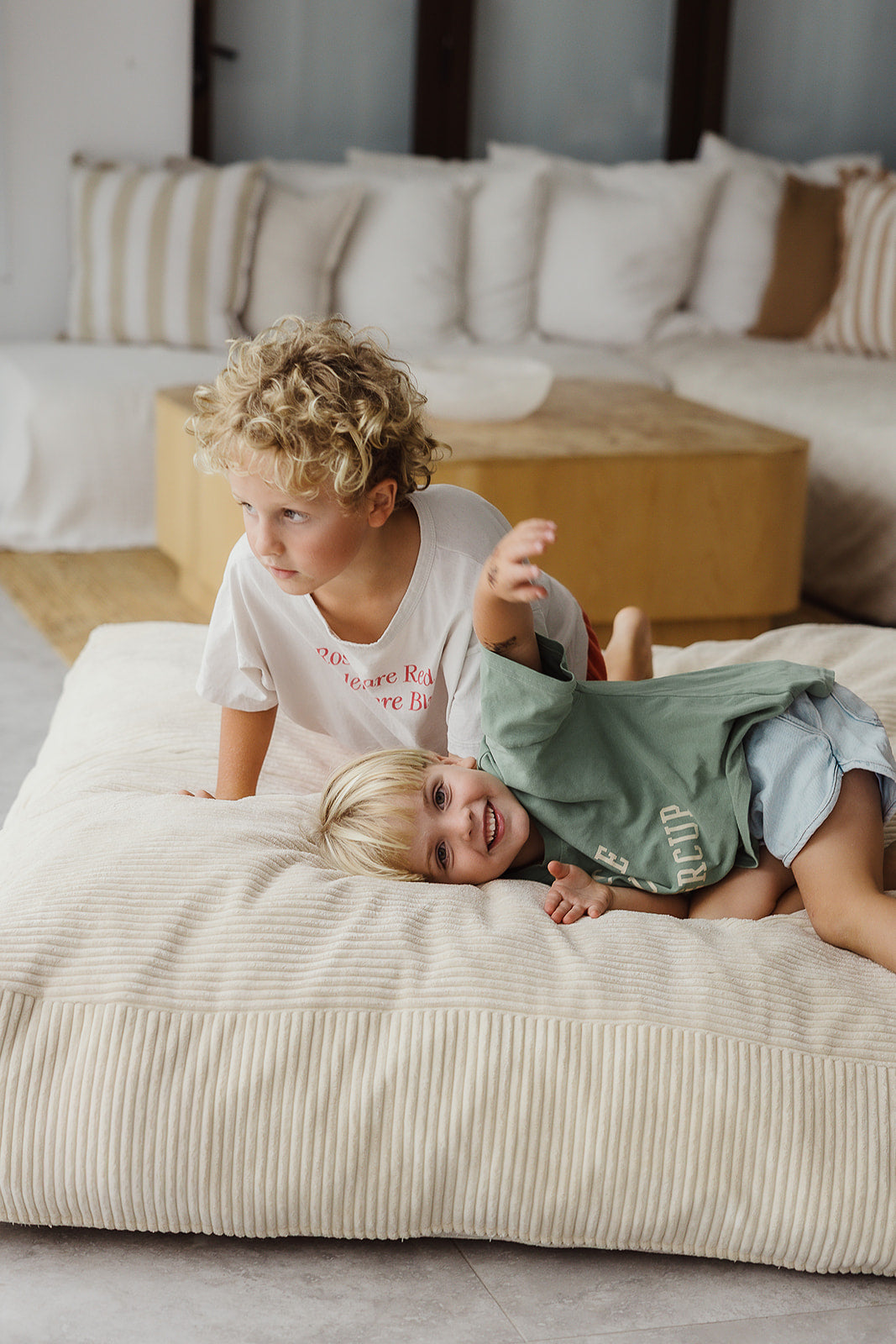 The Play & Rest Corduroy Crash Pillow Mat XL in Cloud Puff / L in Bear Hug Brown