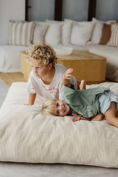 The Play & Rest Corduroy Crash Pillow Mat XL in Cloud Puff / L in Bear Hug Brown