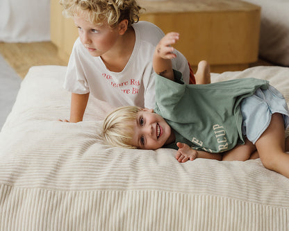 The Play & Rest Corduroy Crash Pillow Mat XL in Cloud Puff / L in Bear Hug Brown