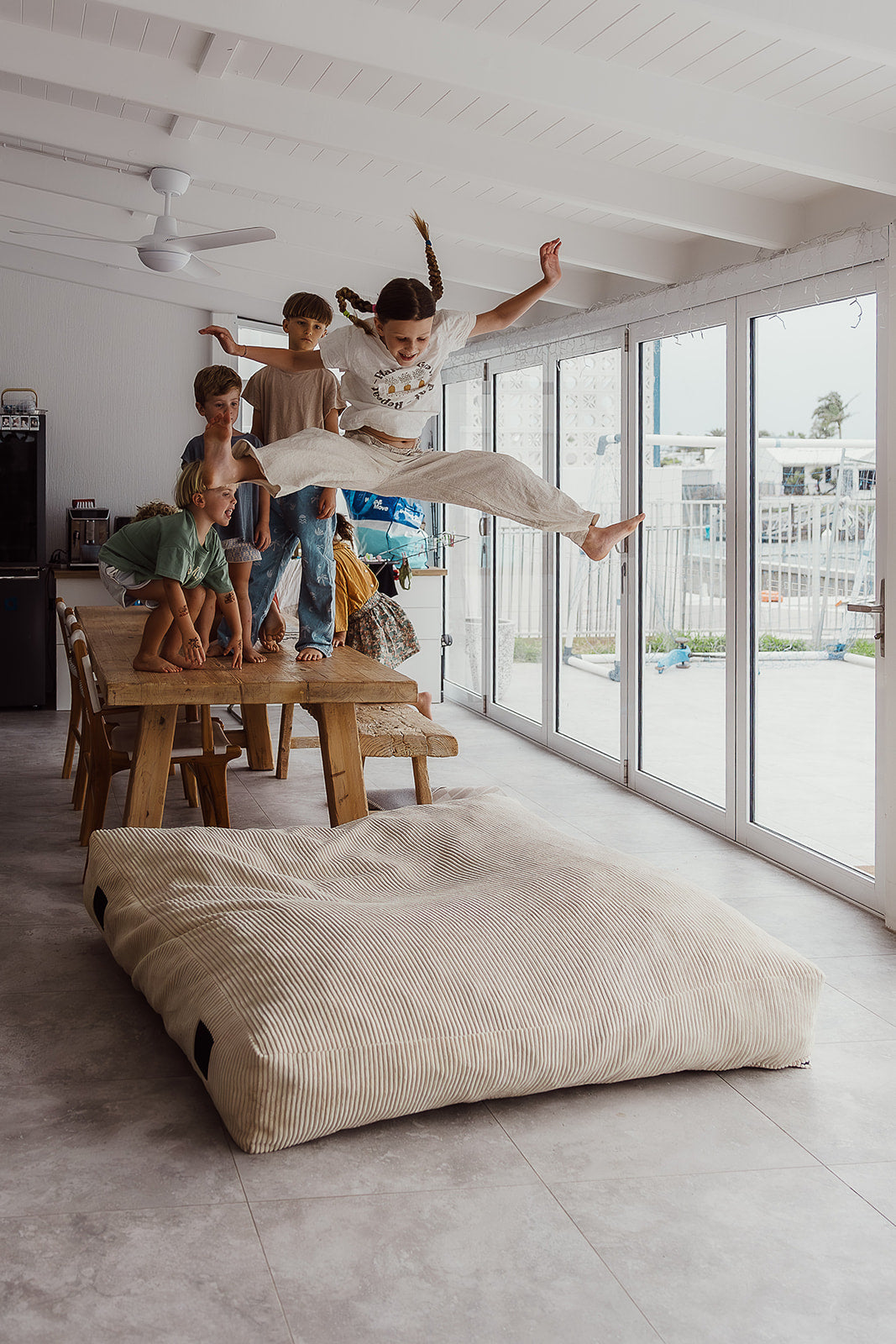 The Play & Rest Corduroy Crash Pillow Mat XL in Cloud Puff / L in Bear Hug Brown