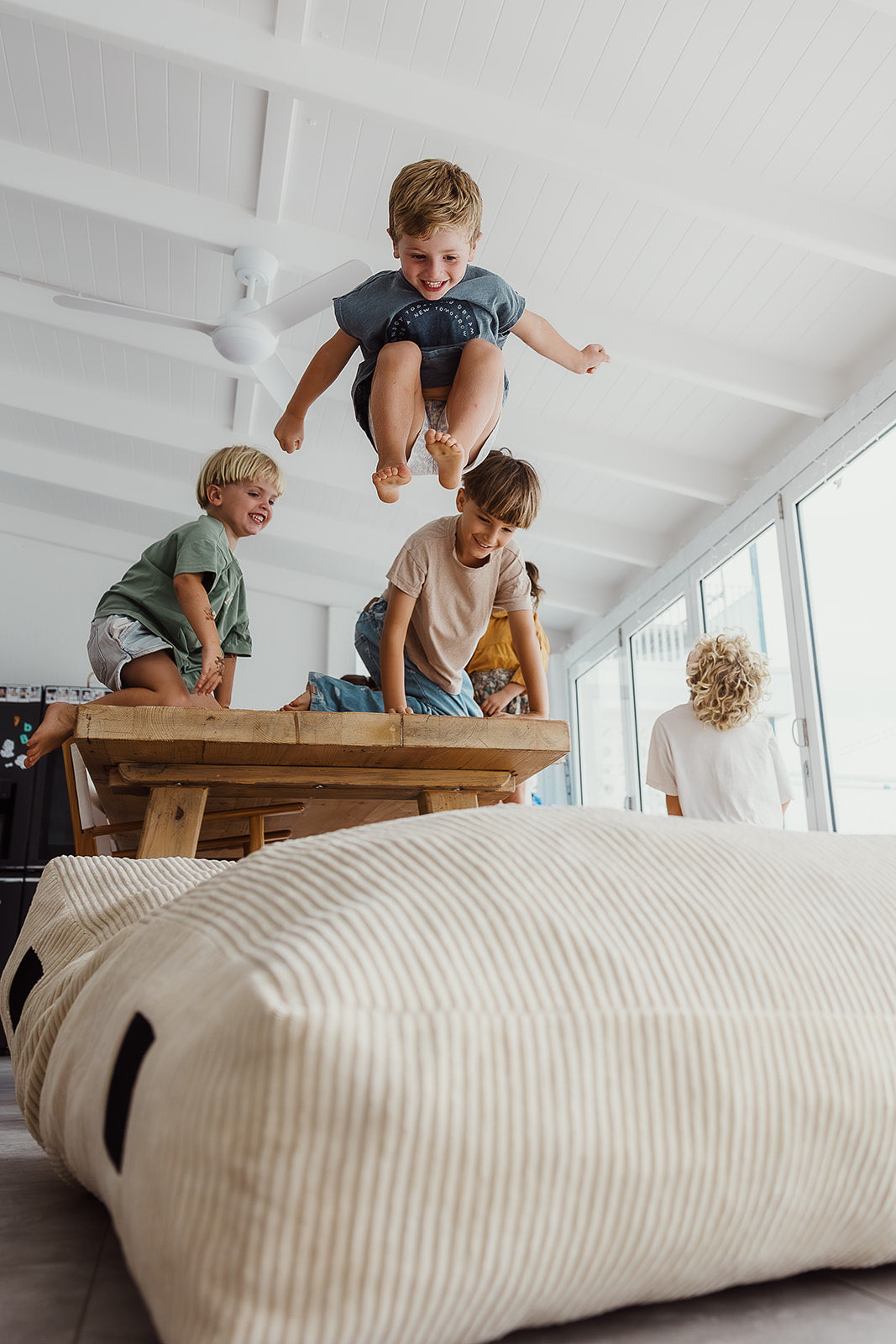 The Play & Rest Corduroy Crash Pillow Mat XL in Cloud Puff / L in Bear Hug Brown